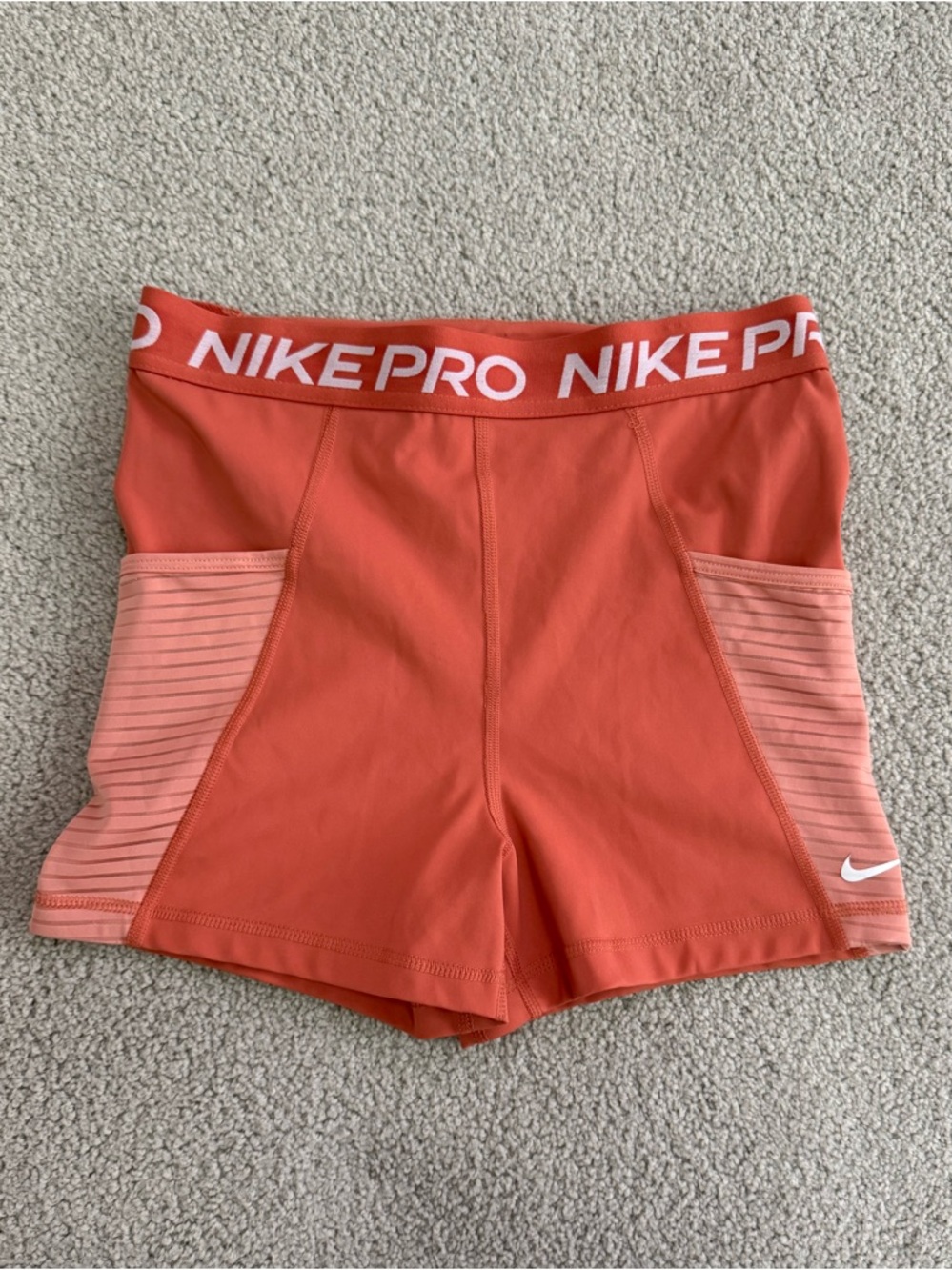 Nike Pro Women's Coral/Peach Bike Shorts with Pockets